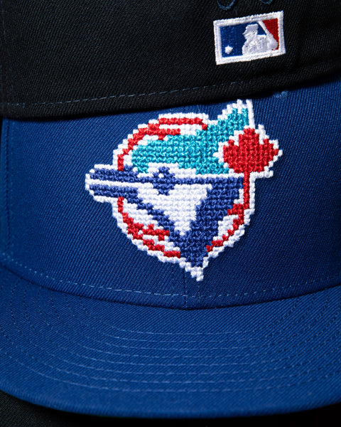 59fifty new era pixel pack collection hero image-59fifty new era toronto blue jays hat with pixelated logo