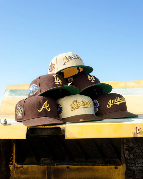 NEW ERA 59FIFTY GOLD RUSH COLLECTION HERO IMAGE-NEW ERA 59FIFTY BROWN AND GOLD FITTED HATS-ARIZONA DIAMONDBACKS-LOS ANGELES DODGERS-NEW YORK METS-ATLANTA BRAVES-HOUSTON ASTROS