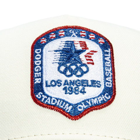 New Era 9Forty A-Frame Los Angeles Dodgers Logo Patch 1984 Olympic Stadium Snapback Hat - White, Royal New Era