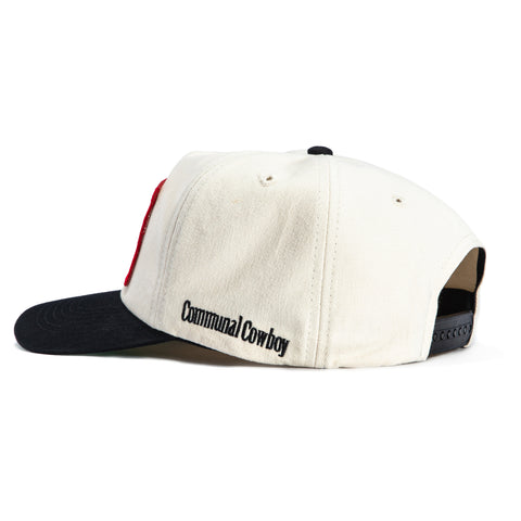 <div>COMMUNAL SMOKE EM SN WHT/BLK SN</div> Communal Cowboy