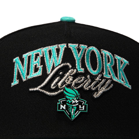 WNBA26 AF940 TIP OFF LIBERTY BLK/MNT SN New Era