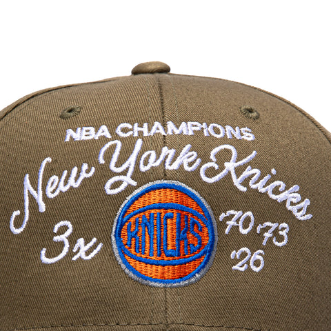 Mitchell & Ness New York Knicks 3x NBA Champions Patch Script Snapback Hat - Olive Mitchell and Ness