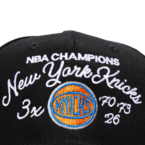 Mitchell & Ness New York Knicks 3x NBA Champions Patch Script Snapback Hat - Black Mitchell and Ness